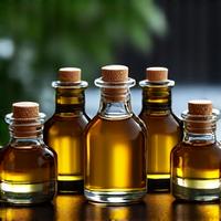 Assortment of exotic, cold-pressed botanical oils in small bottles.
