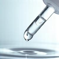 Dropper bottle showcasing clear, viscous hyaluronic acid serum.